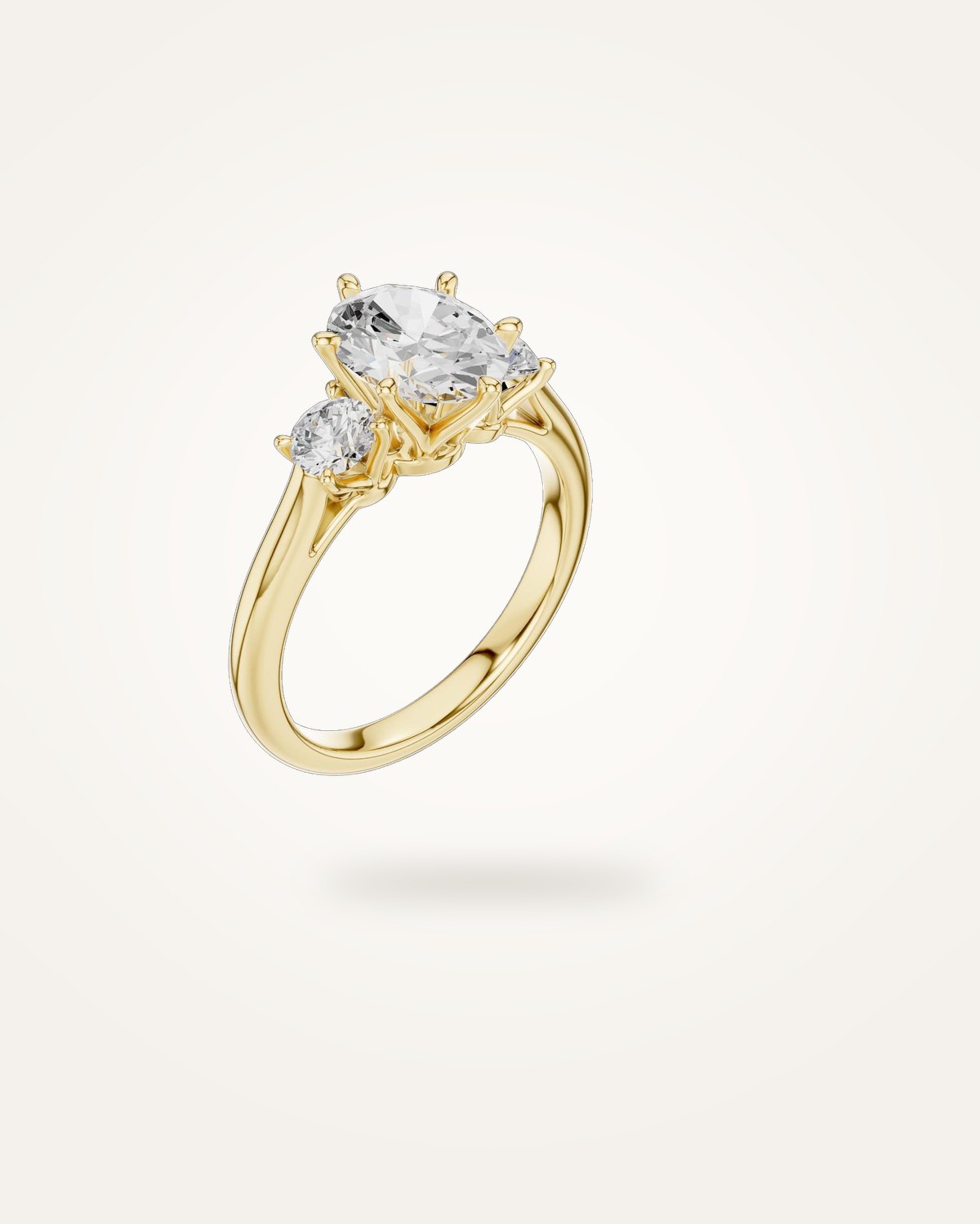 Oval-cut three-stone engagement ring, 1.9 ct
