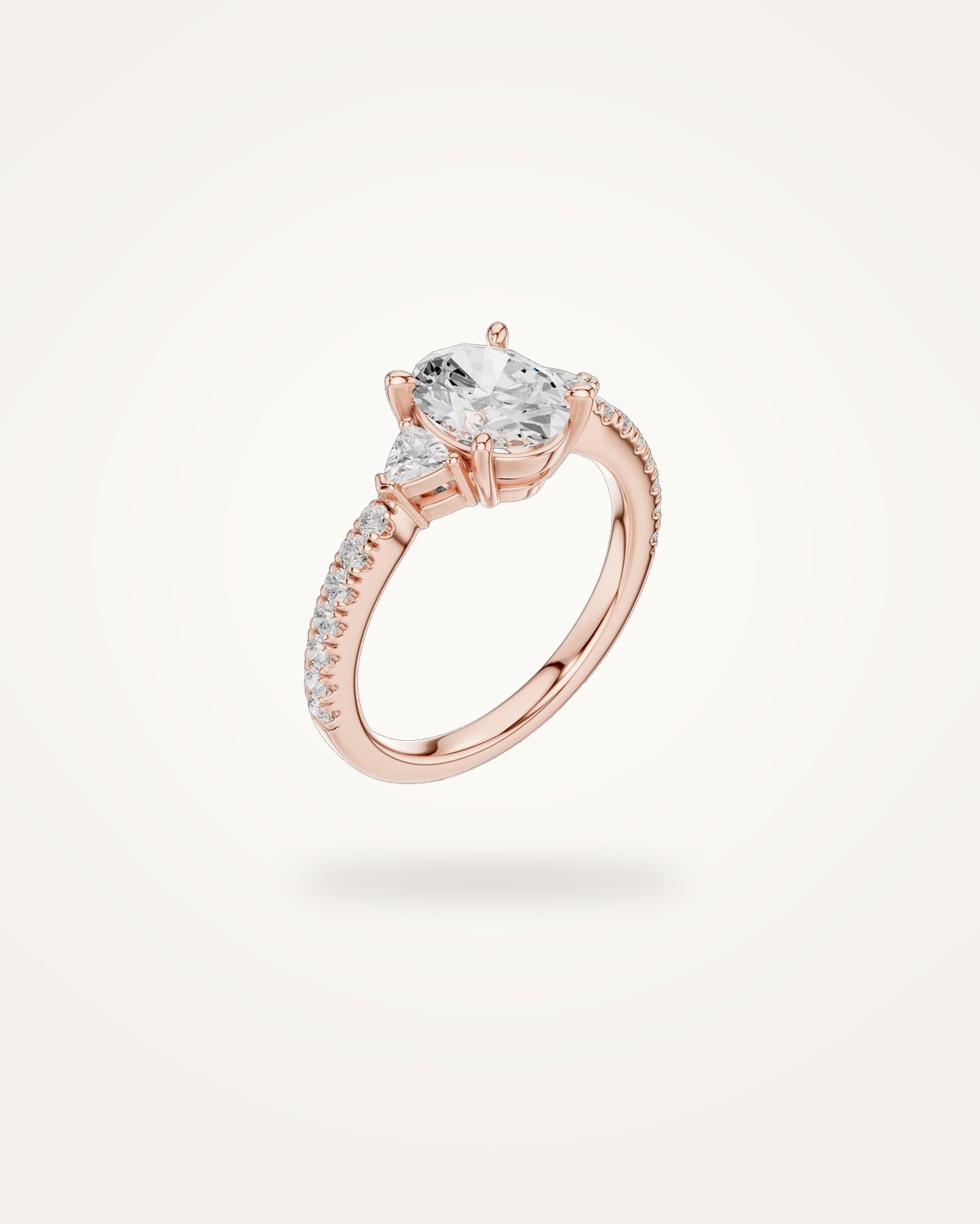 Oval-cut three-stone engagement ring, 1.96 ct