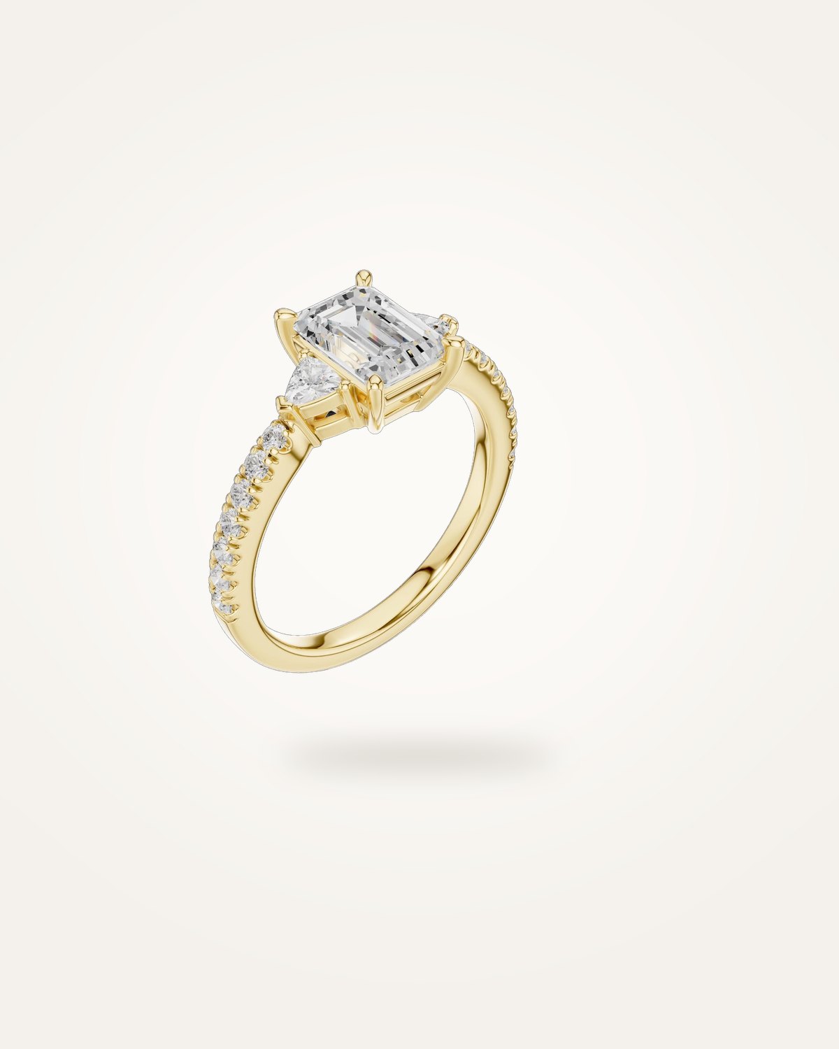 Emerald-cut three-stone engagement ring