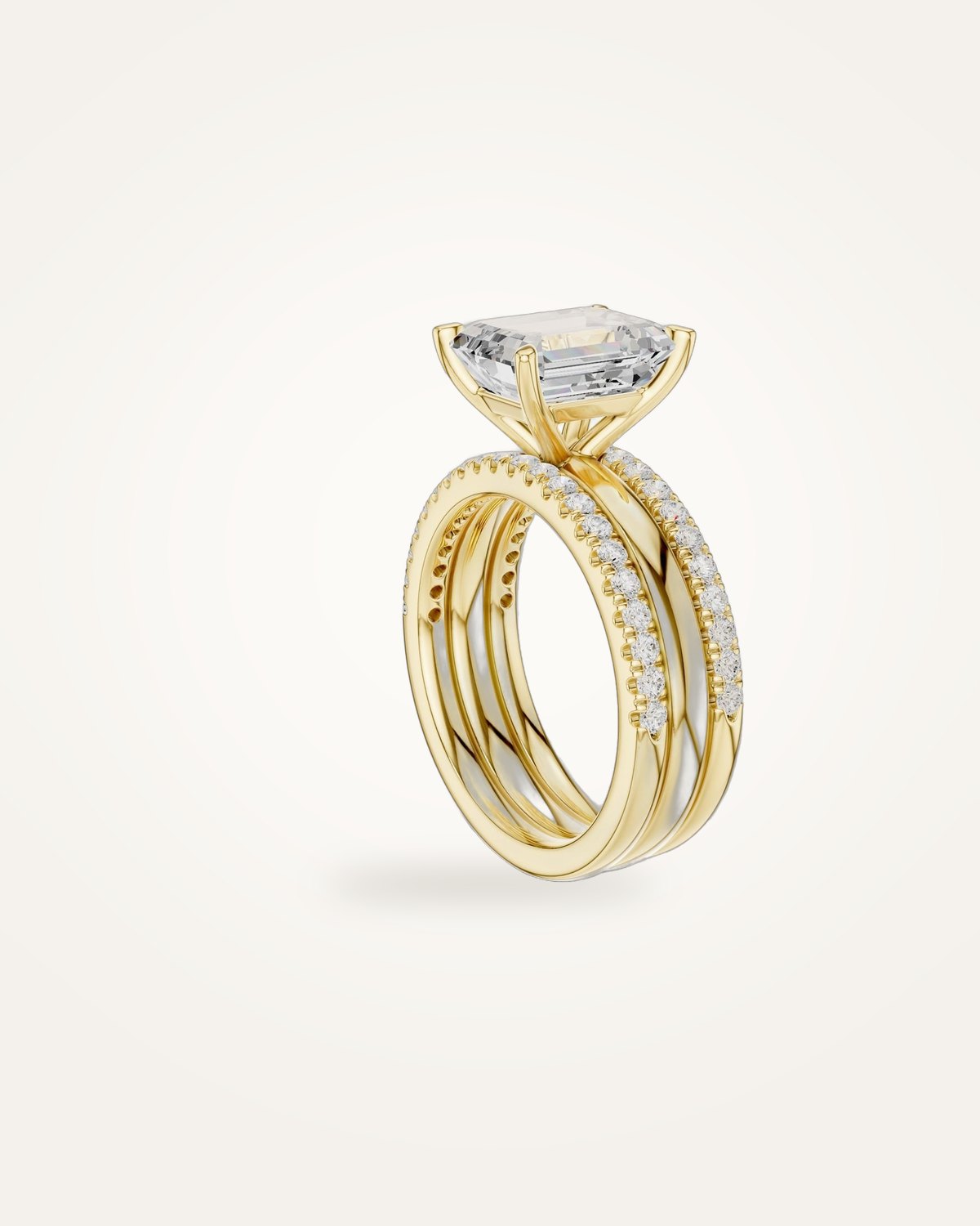Emerald-cut diamond ring, triple-row band